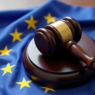 A gavel atop a European Union flag symbolizing EU law and justice