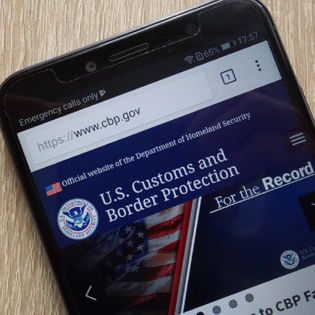 U.S. Customs and Border Protection website displayed on a modern smartphone