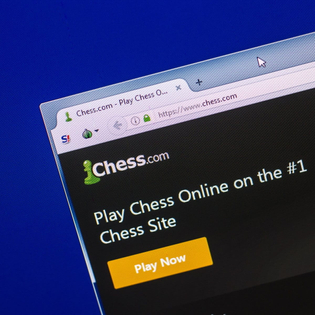 Homepage of Chess website on the display of PC.