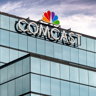 Comcast building with their logo on it.