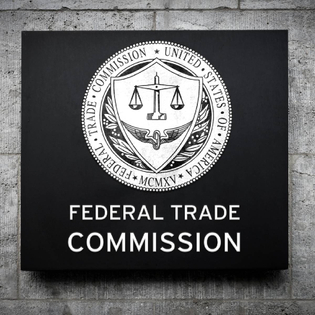 Closeup of the FTC logo on a building