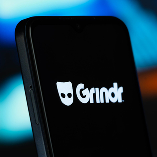 Grindr logo on a smartphone screen.
