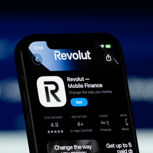 App Store page of the Revolut app is seen on a smartphone screen.