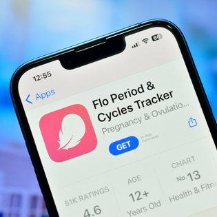 Flo period tracking app download page on the screen of an iPhone.