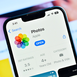 iPhone displaying the App Store page for Photos.