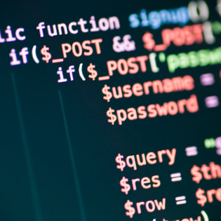 PHP code lines on a monitor.