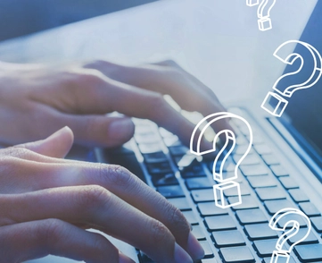 Fingers typing on keyboard with question marks overlayed
