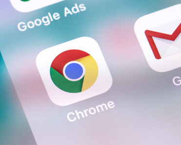 A close-up of the Google Chrome web browser app icon on a cell phone screen.