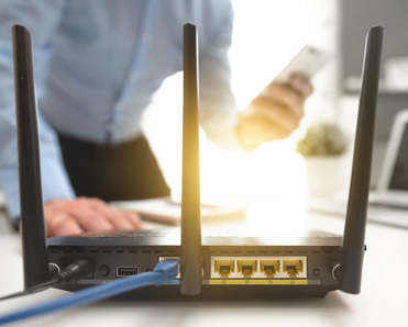 Man working on a router