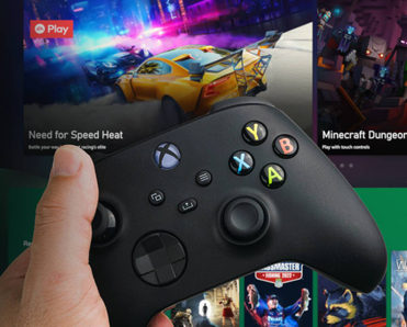 Man holding an Xbox controller with Cloud Gaming Pass blurred in the background. 