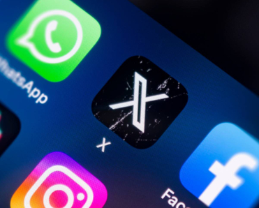 Close-up of a smart phone screen with a focus on the X (formely Twitter) app icon.
