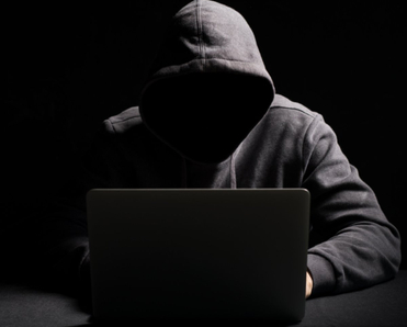 Hacker at laptop