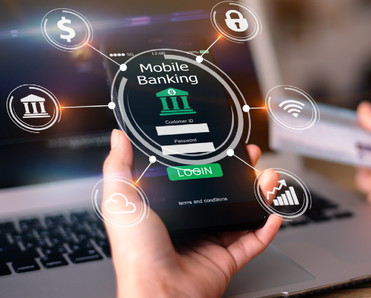 Mobile banking concept with a close-up of hands using mobile phone and holding credit card