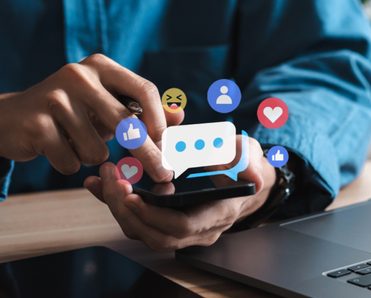 Text bubbles and emojis float above a phone.