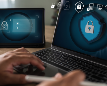 Antivirus alert is shown on a tablet and laptop.