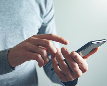 A person holding a smartphone.