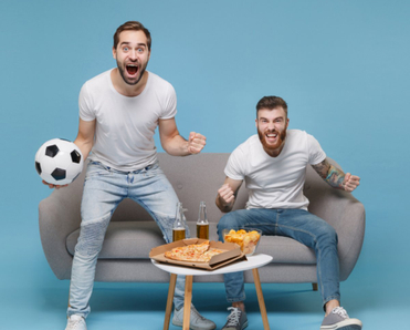 Two friends watching soccer