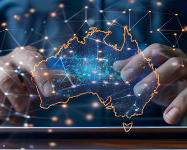 Man holding a tablet with a holographic Australia map above it 