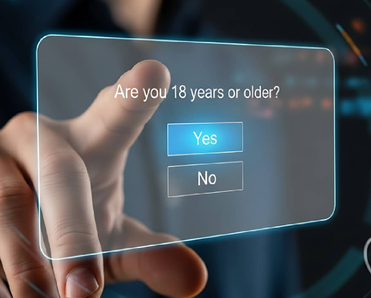 A concept of age verification with a person prompted if they are 18 years or older yes or no
