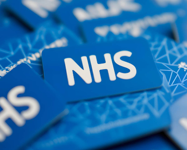 National Health Service logo on blue background