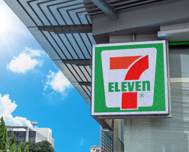 7-Eleven franchise logo sign on building