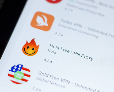 A closeup of free VPN apps like Hola and Turbo VPN on smartphone