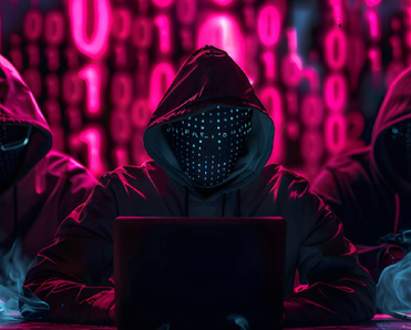 A group of hooded hackers in front of laptops with neon zeros and ones cascading in the background