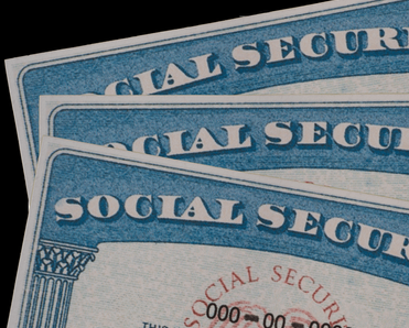 Close up of a stack of SSN cards.