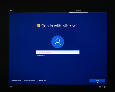 Sign-in with Microsoft field sign on a computer display during Microsoft Windows installation.