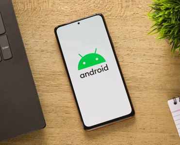 Android logo on phone screen.