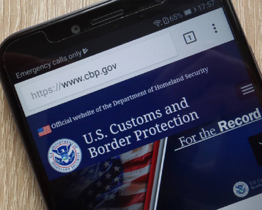 U.S. Customs and Border Protection website displayed on a modern smartphone