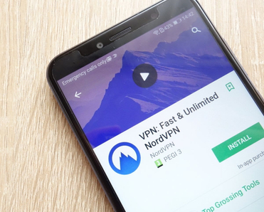 VPN: Fast and Unlimited NordVPN app on Google Play Store website displayed on phone screen.