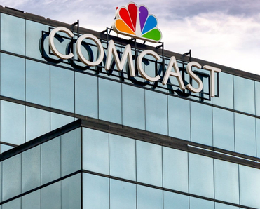 Comcast building with their logo on it.