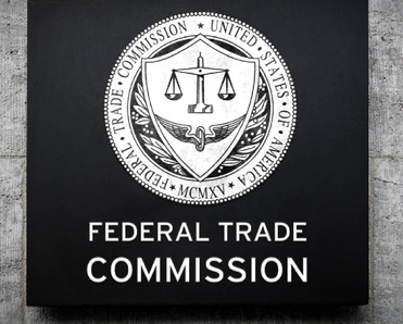Closeup of the FTC logo on a building