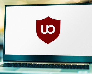 Laptop computer displaying logo of uBlock Origin.