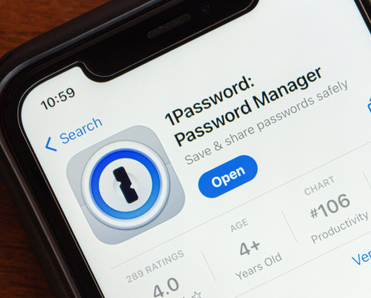 1Password app is displayed in the App Store on an iPhone.