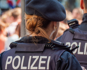 German police officers on duty on the street. 
