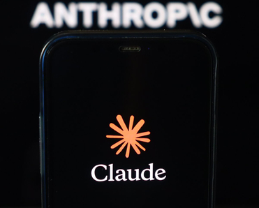 Claude logo on smartphone with Anthropic logo in the background.