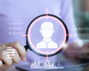 concept of someone looking up another person using a data broker or people search site like USPhoneBook, with a person holding a magnifying glass over digital profile image above a laptop and 
