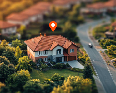 Aerial view of suburban neighborhood with house pinned red icon
