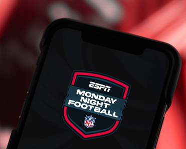 Closeup of a smartphone screen displaying ESPN Monday Night Football logo