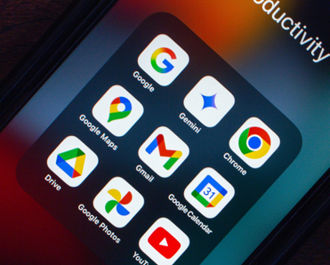 Various Google productivity apps like Gemini, Chrome, Maps, Gmail, Drive, Photos, and YouTube are displayed on a smartphone screen.