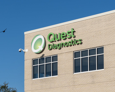 Quest Diagnostics logo on a building.
