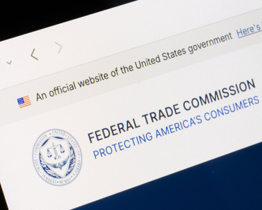 The seal of the Federal Trade Commission (FTC), an independent federal agency that enforces federal competition and consumer protection laws, is seen on its website.