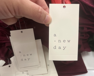 A New Day priceless tag.
