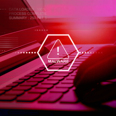 Red filter on image of laptop screen and keyboard with warning of malware in the middle