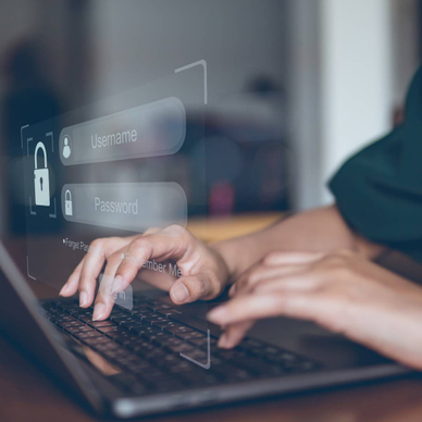 Woman typing on computer user and password login on visual screen.