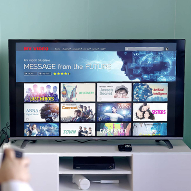 An image concept of a woman streaming Amazon Prime Video on smart TV