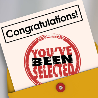 An image of a congratulatory flier sticking out of a manila folder with the text &quot;You&#x27;ve been selected&quot;