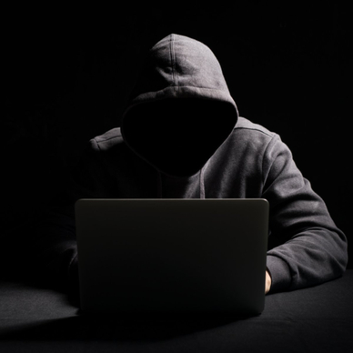 Hacker at laptop